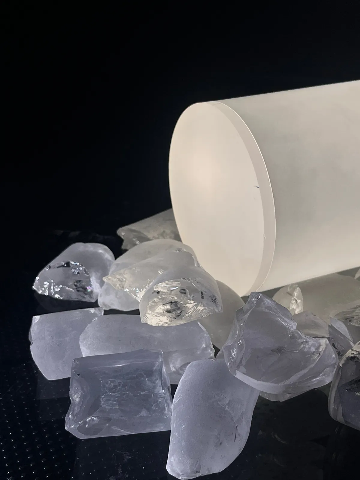 Sapphire ingot and crystal pieces